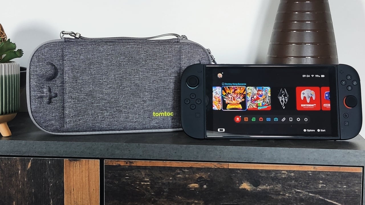 The Nintendo Switch 2 with the tomtoc slim carrying case in grey, stood up