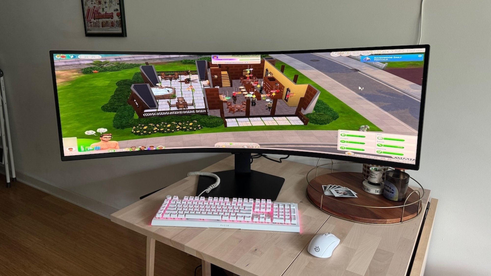 the  Samsung Odyssey G95C on a small desk