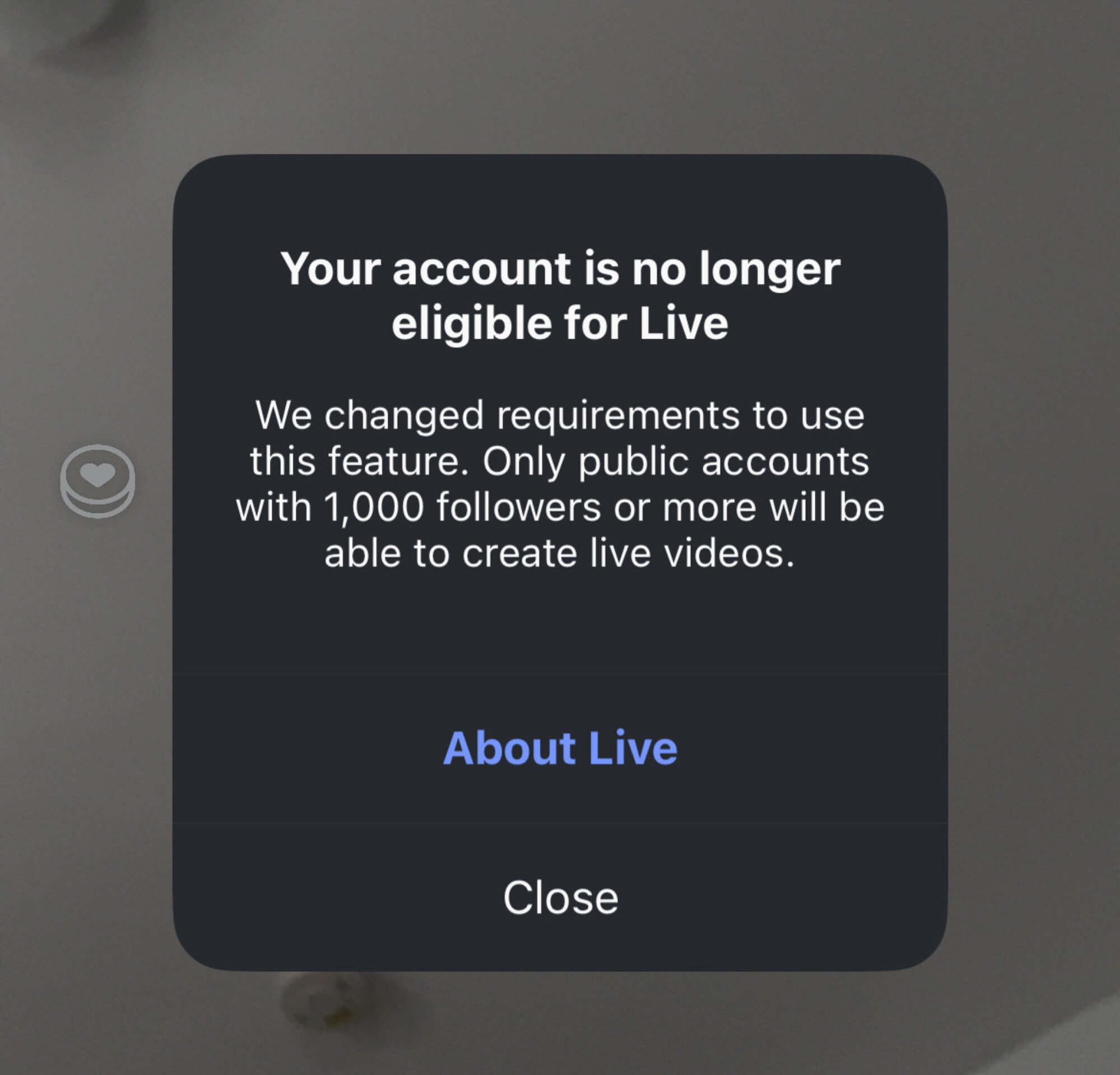 A notice that reads "our account is no longer eligible for Live. We changed the requirements to use this feature. Only public accounts with 1,000 followers or more will be able to create live videos