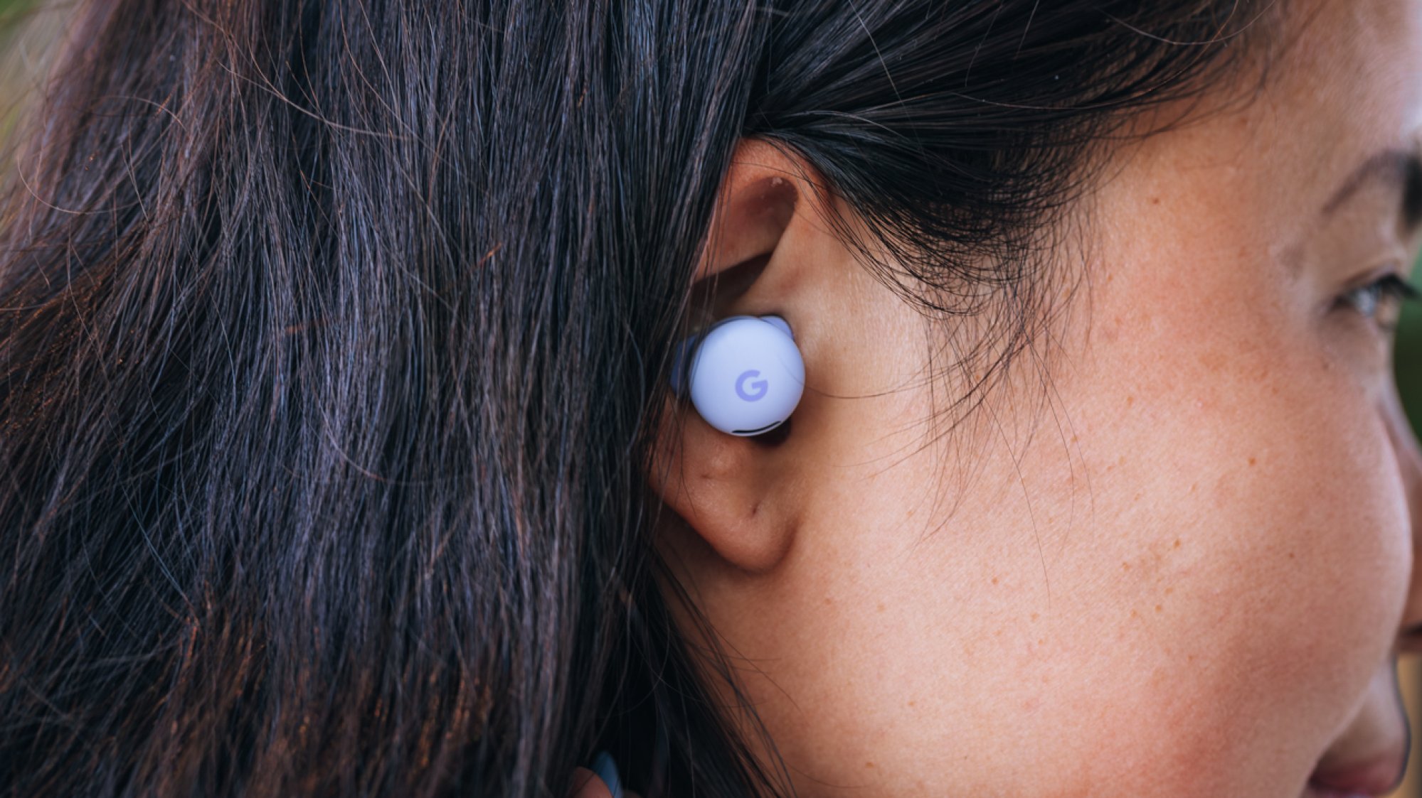 pixel buds 2a in woman's ear
