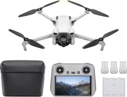 dji mini 3 drone, bag, display, and batteries against a white background