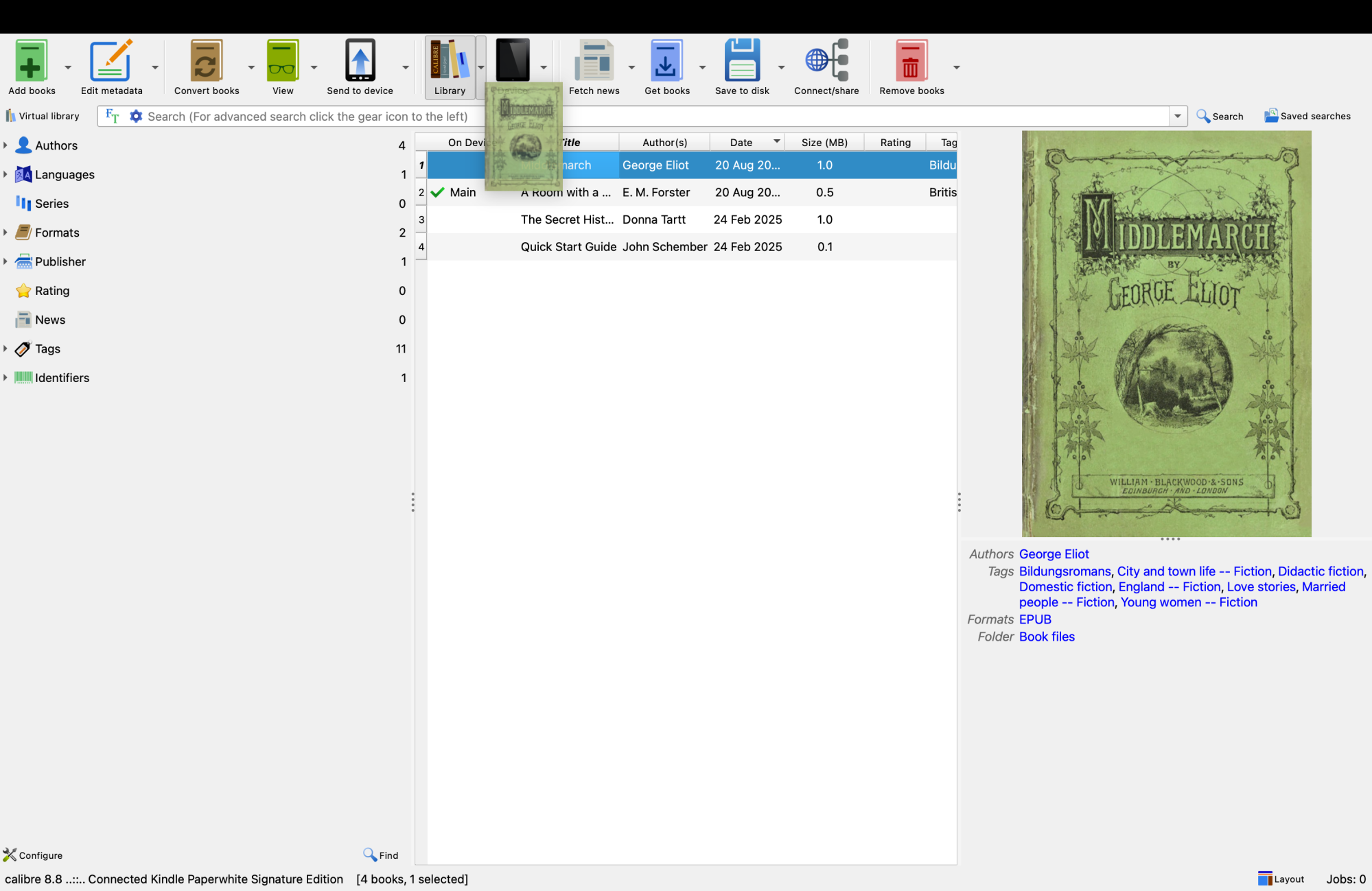A book being dragged over the device icon in Calibre