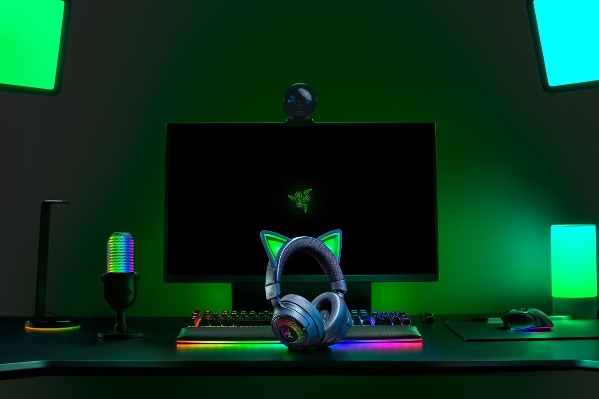 the razer kraken kitty v3 pro in a dark pc gaming setup