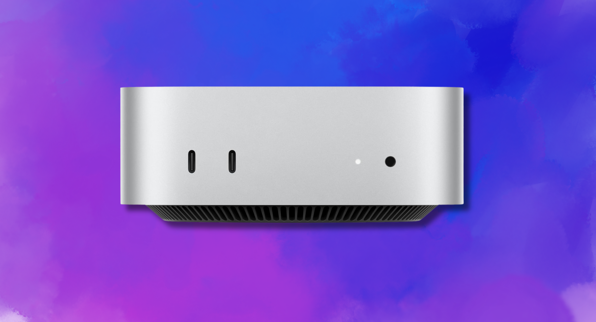 Apple Mac Mini 4 against a colorful background.