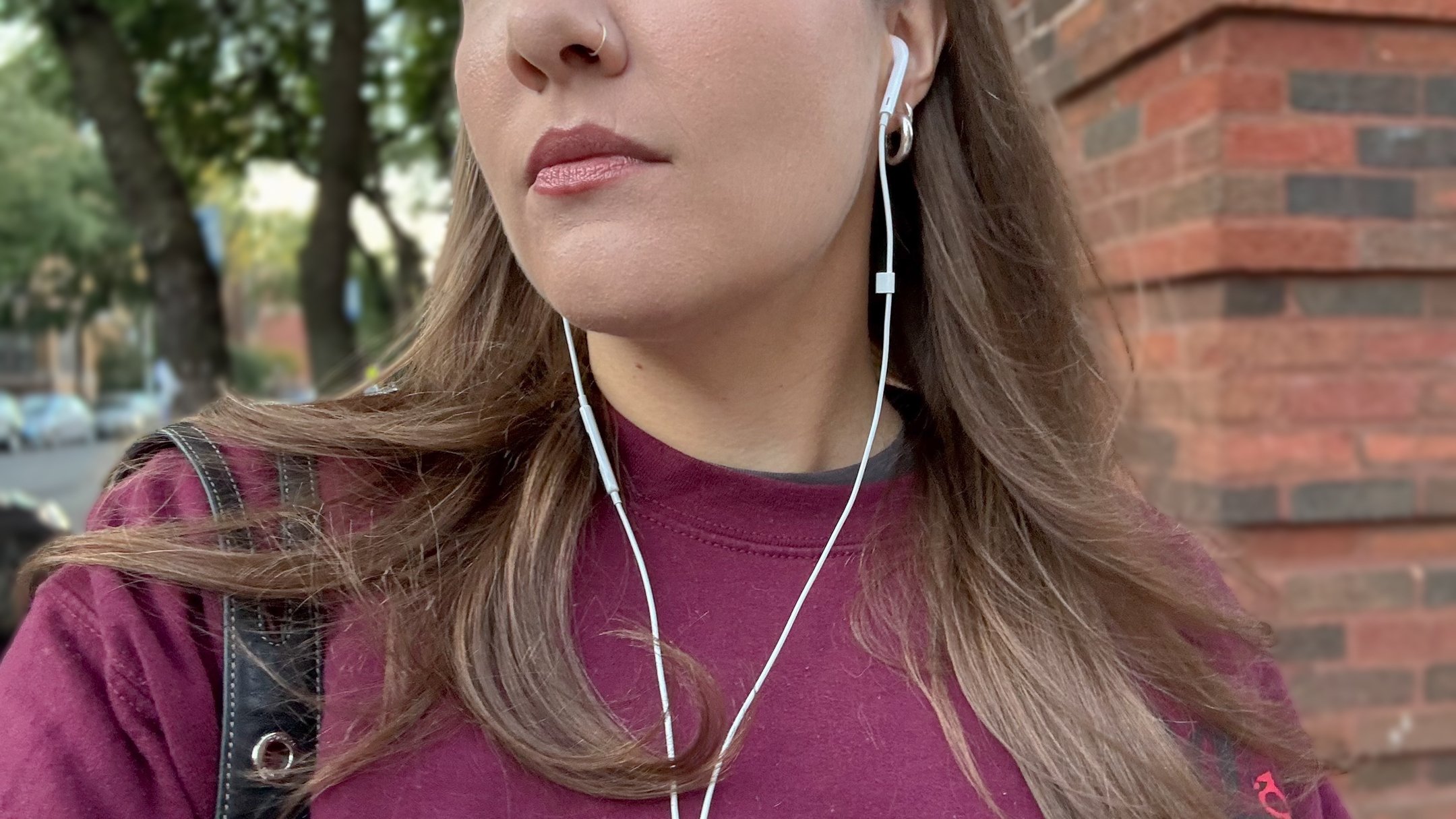 a selfie of the author wearing a pair of apple earpods