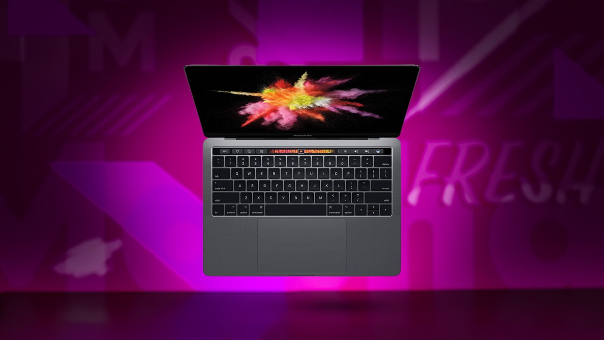 Apple MacBook Pro 13-inch on pink background