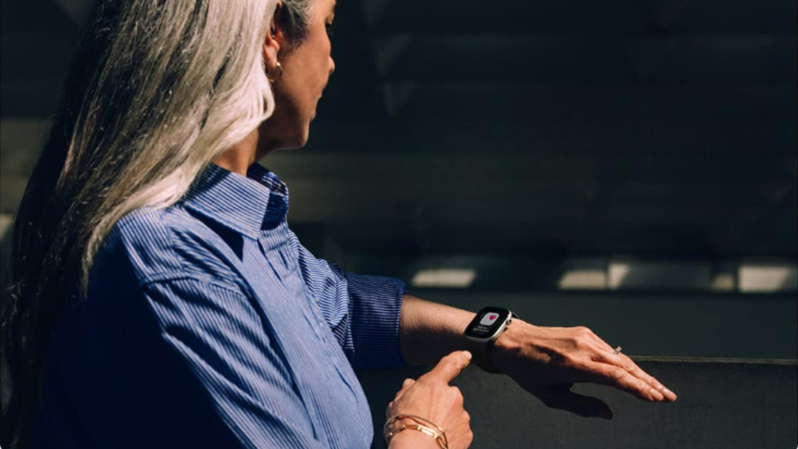 woman wearing Apple Watch Series 11