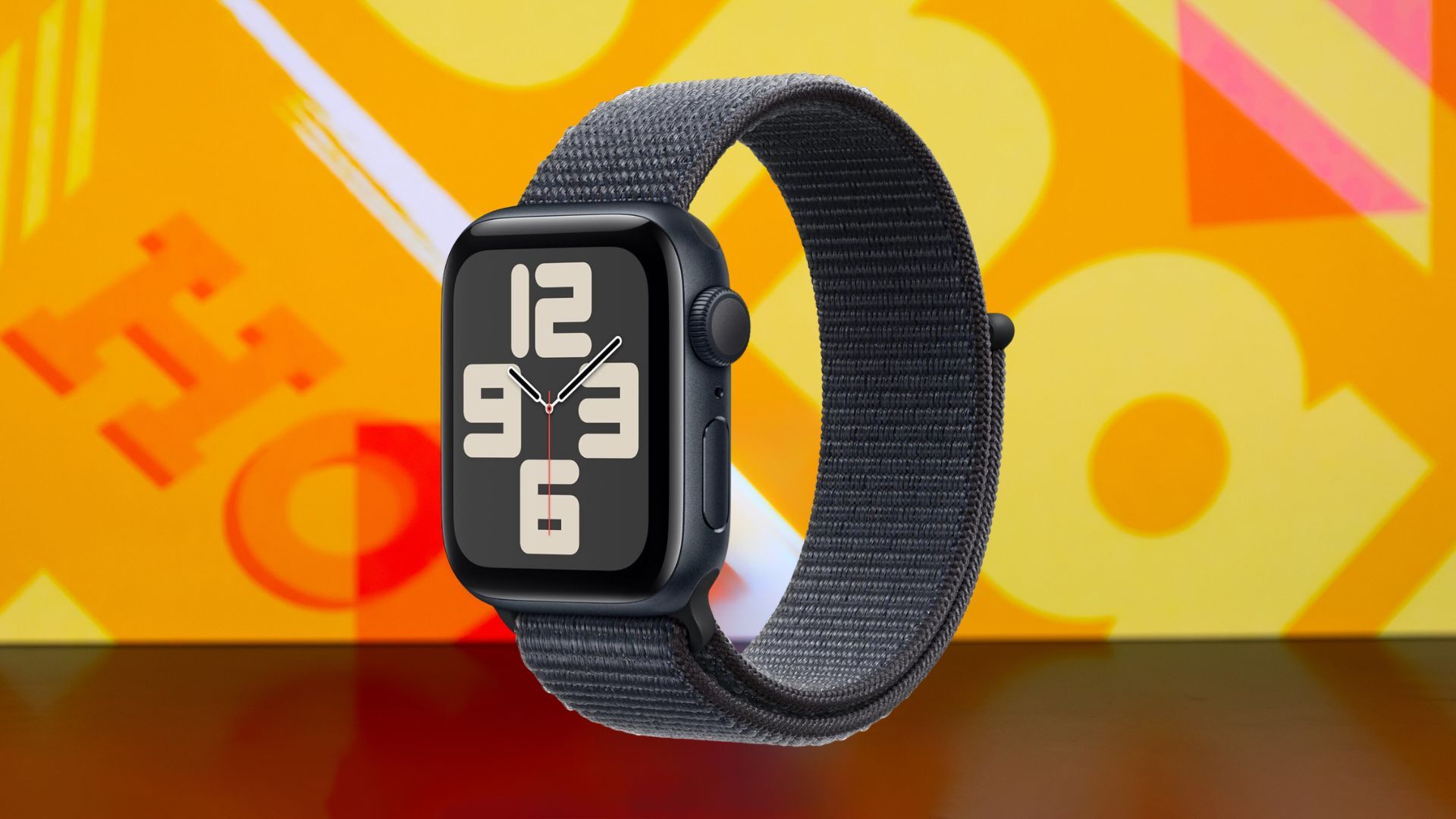apple watch se 2 against a yellow patterned background
