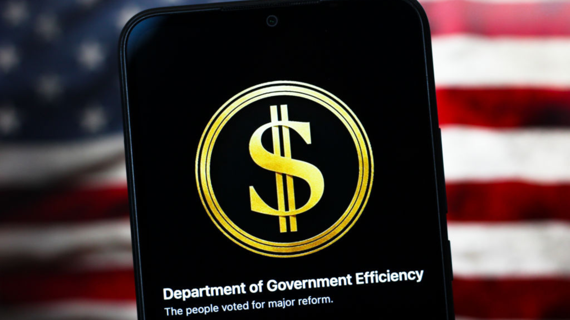 The Department of Government Efficiency (DOGE) logo is seen displayed on a smartphone screen.