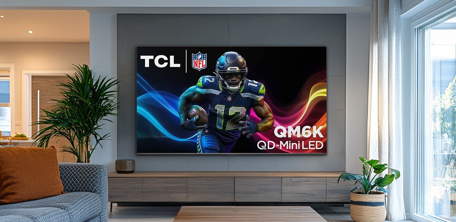 the TCL QM6K Series QD-Mini LED QLED 4K in a living room
