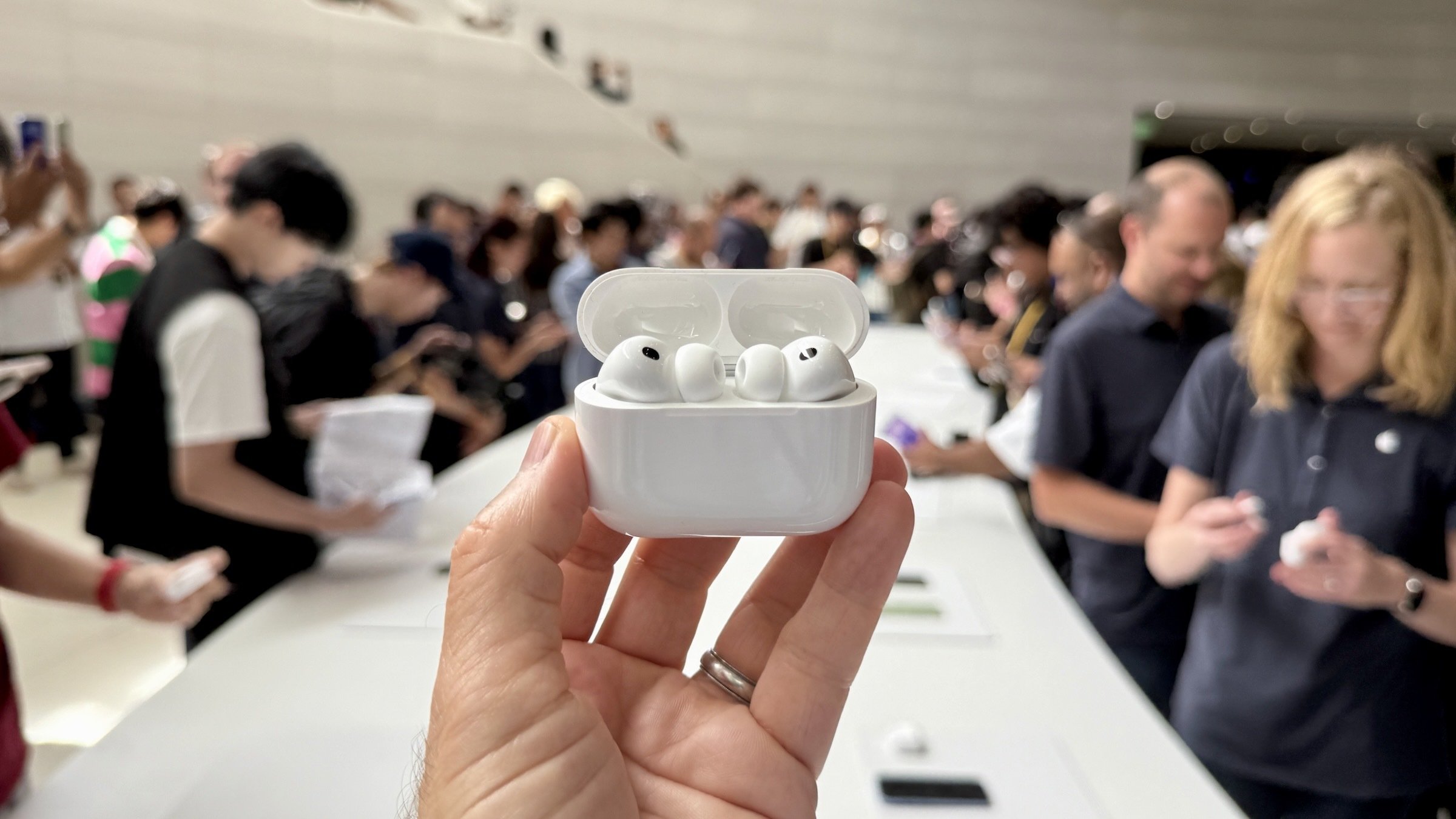 apple airpods pro 3 charging case on display at apple park headquarters