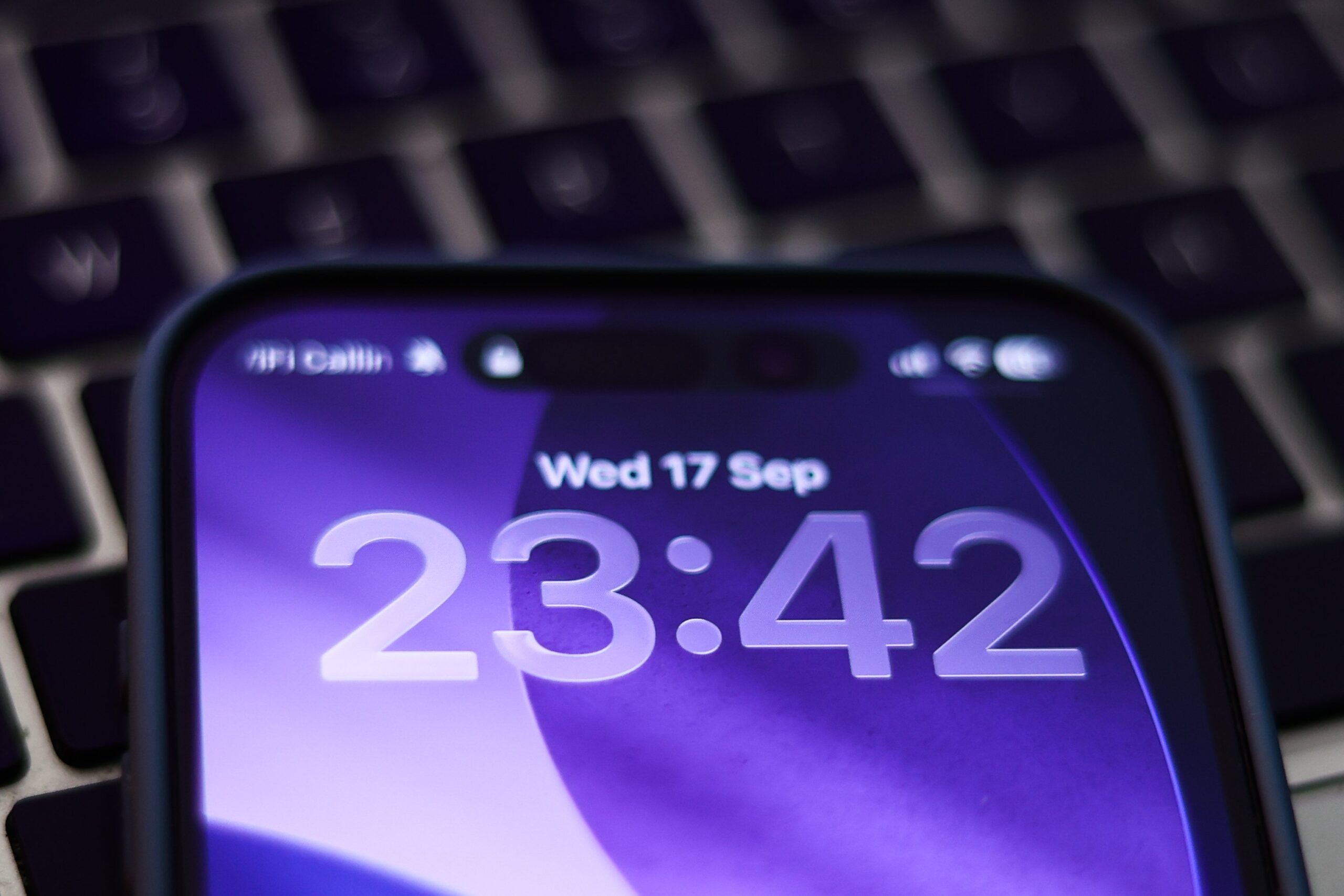 iOS 26 locked screen is seen displayed on a phone screen in this illustration photo