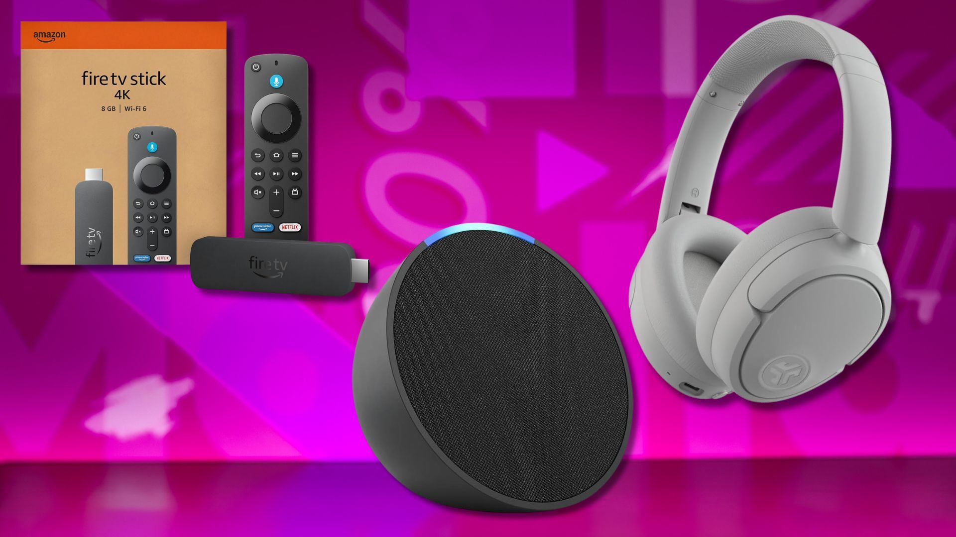 from left to right: fire tv stick 4k, an echo pop, and jlab headphones against a pink patterned background