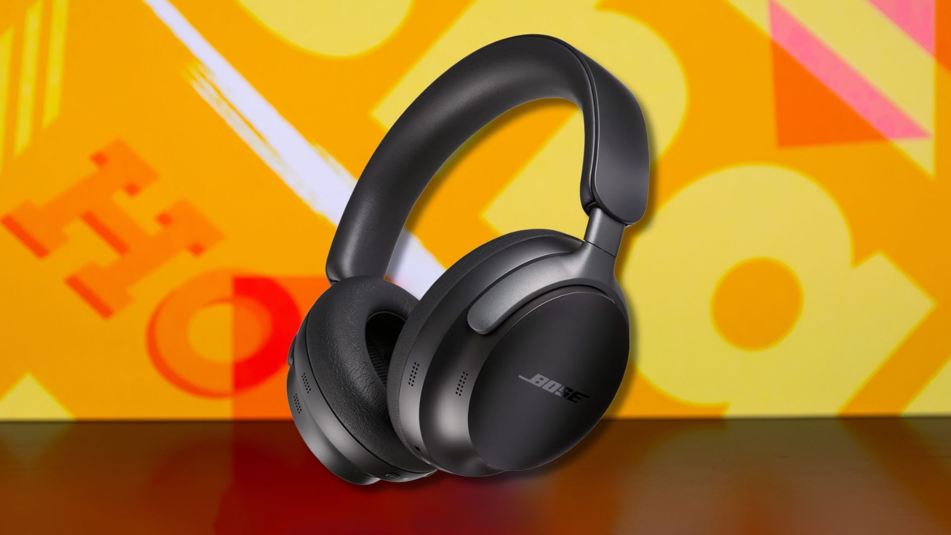 bose quietcomfort ultra headphones against a yellow patterned background