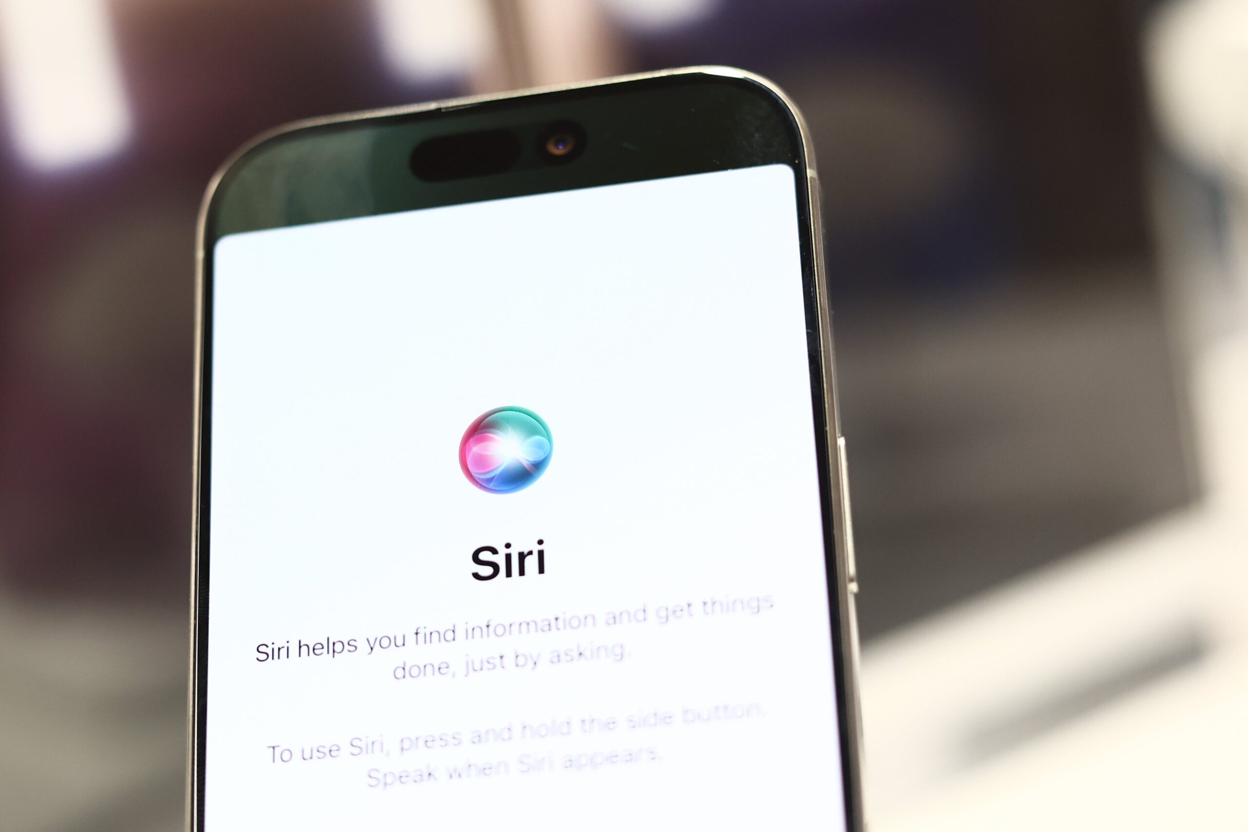 Apple Siri assistant on phone screen