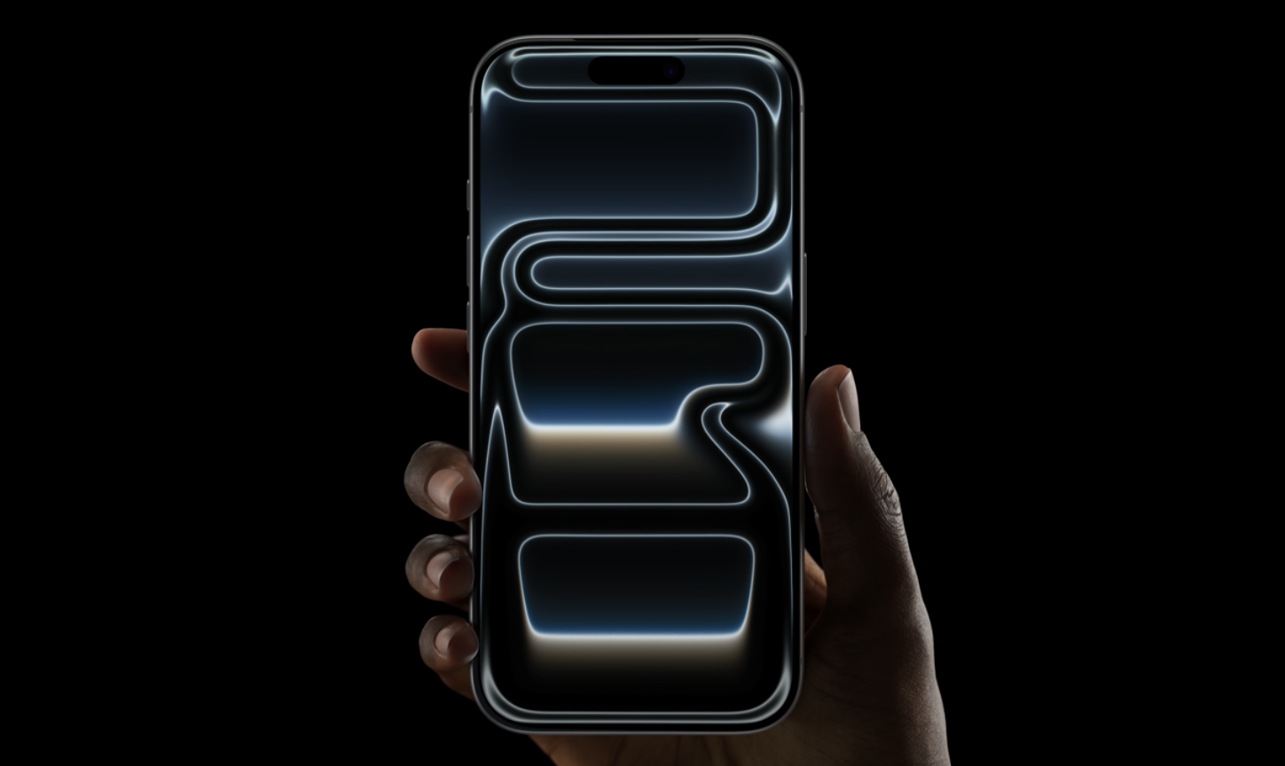 A hand holds the new iPhone 17. 
