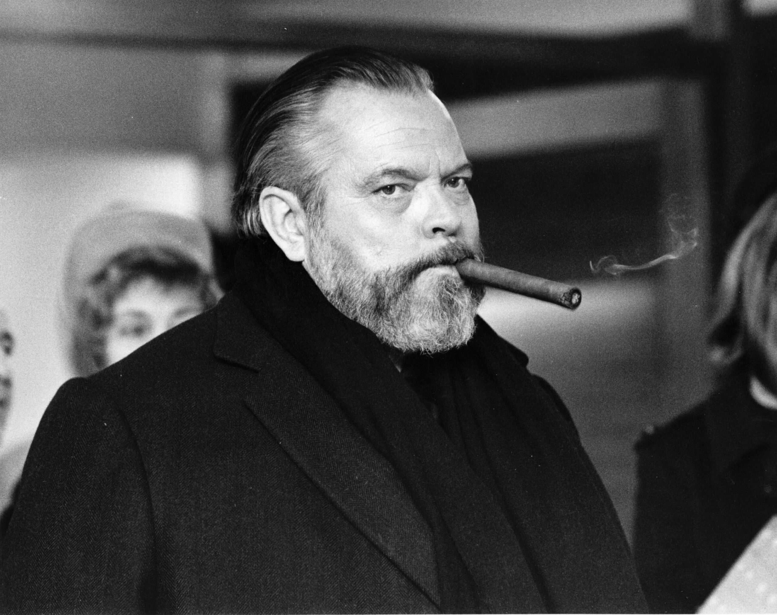 orson welles with a cigar in mouth