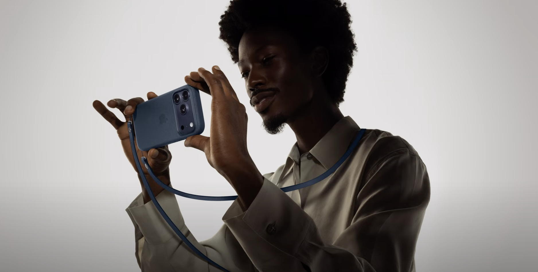 A man tests out the new iPhone camera.