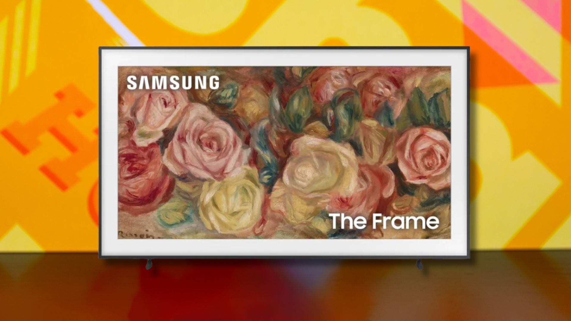 samsung the frame tv against a yellow patterned background