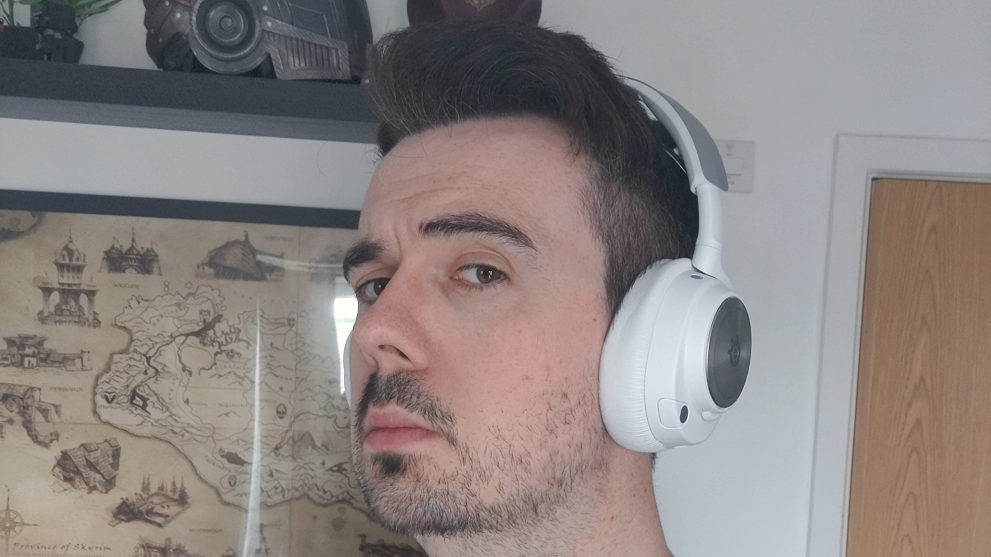 Wearing the SteelSeries Arctis Nova Pro Wireless gaming headset in white