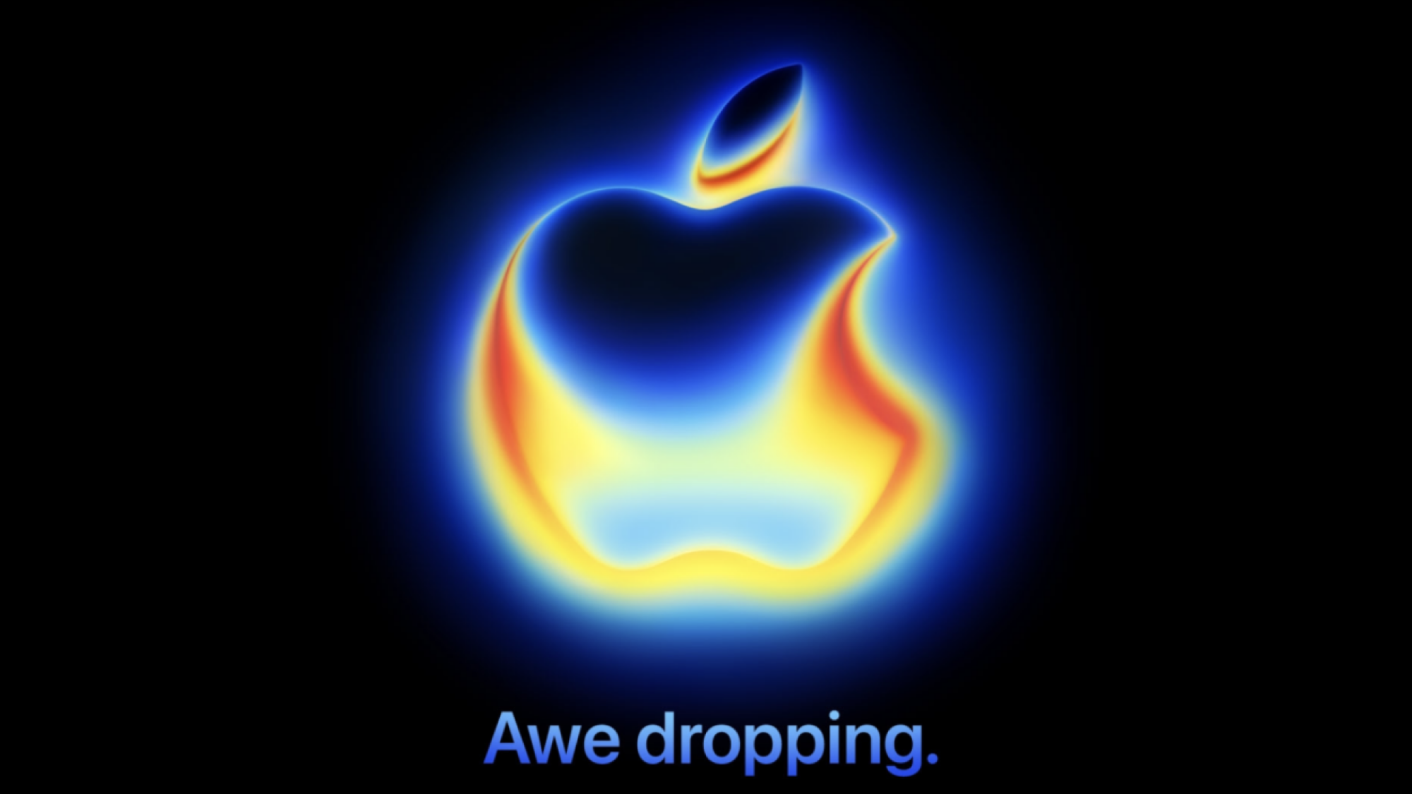 The Apple logo against a black background, shining with an orange and yellow chrome effect. Under the logo are the words "awe dropping"