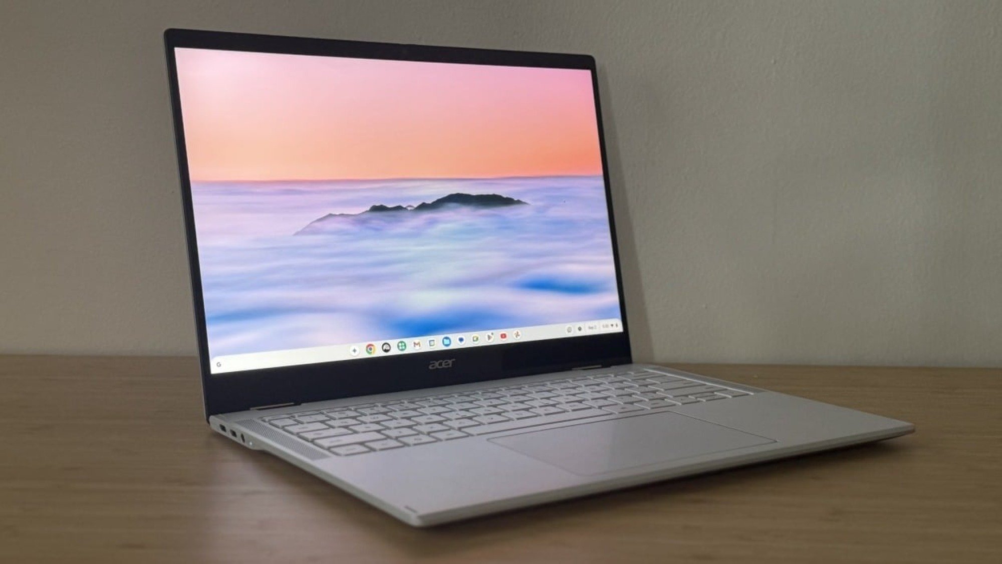 Acer Chromebook Plus Spin 514 (CP514-5HN) sits on a table displaying a nature scene.