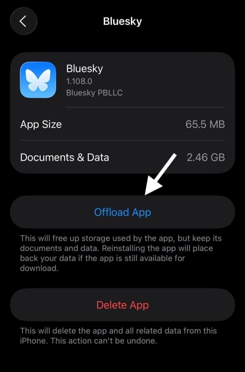 iPhone app settings screen for Bluesky with an arrow pointing to the clear cache button
