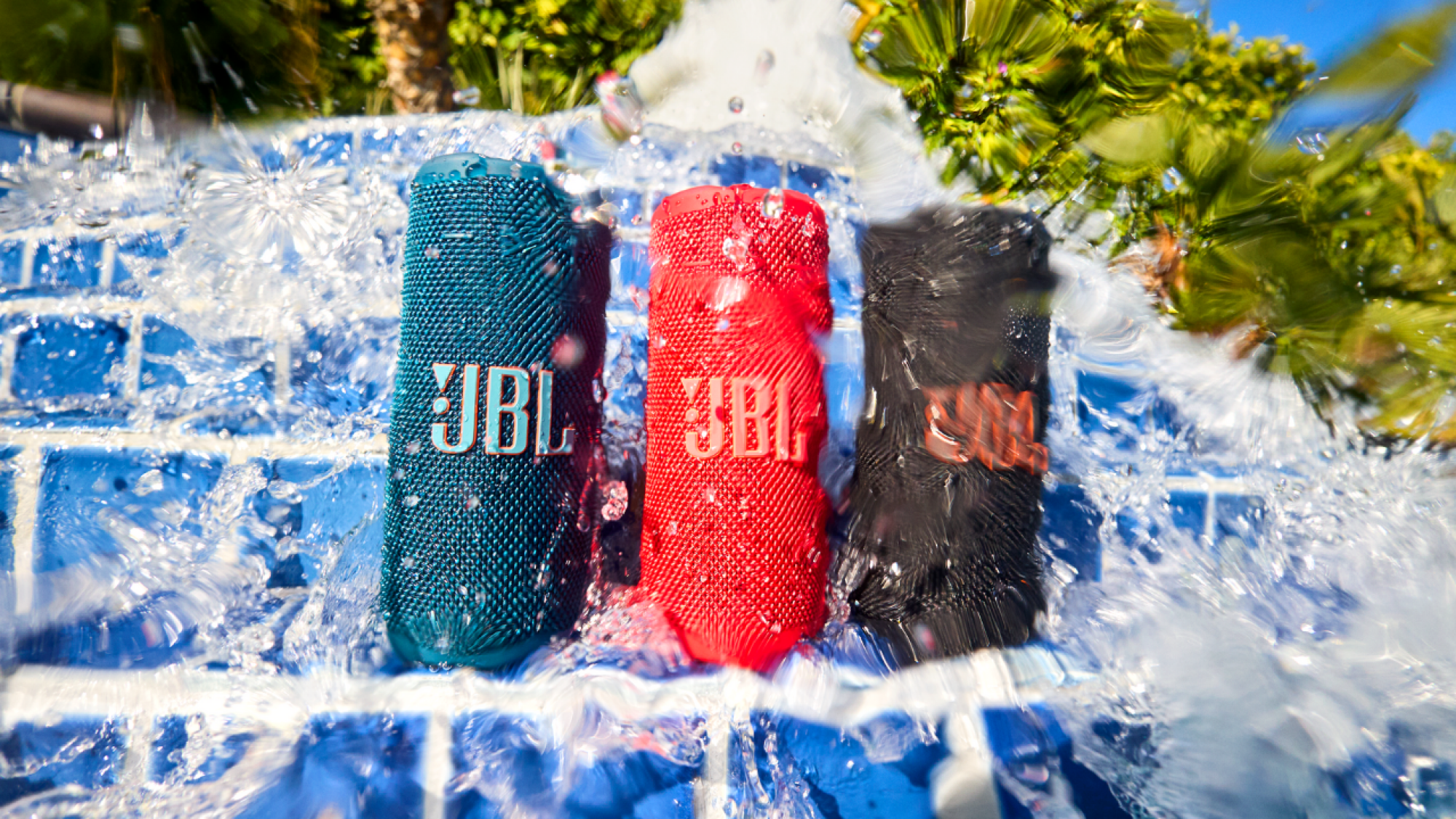 three JBL Grip speakers