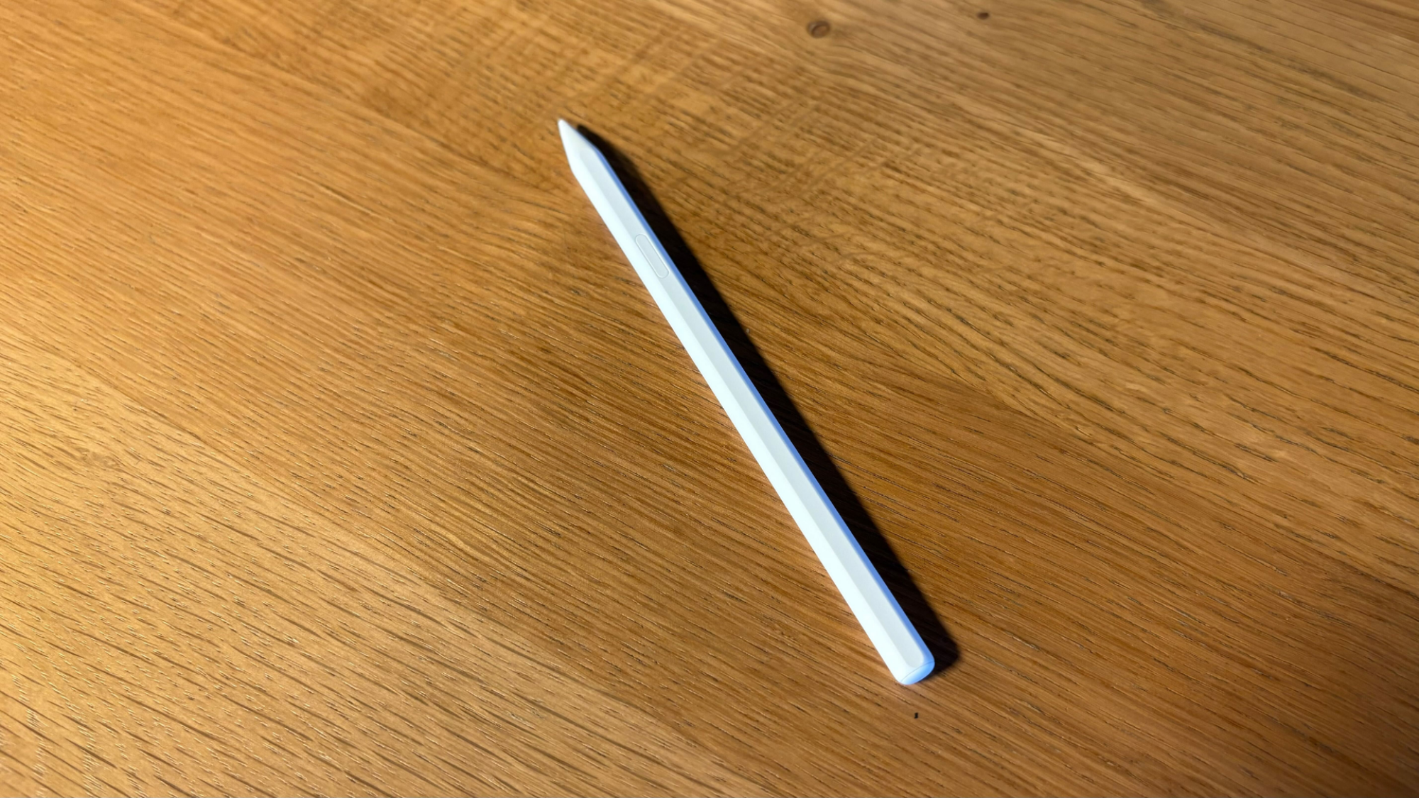 A Samsung S Pen on a table.