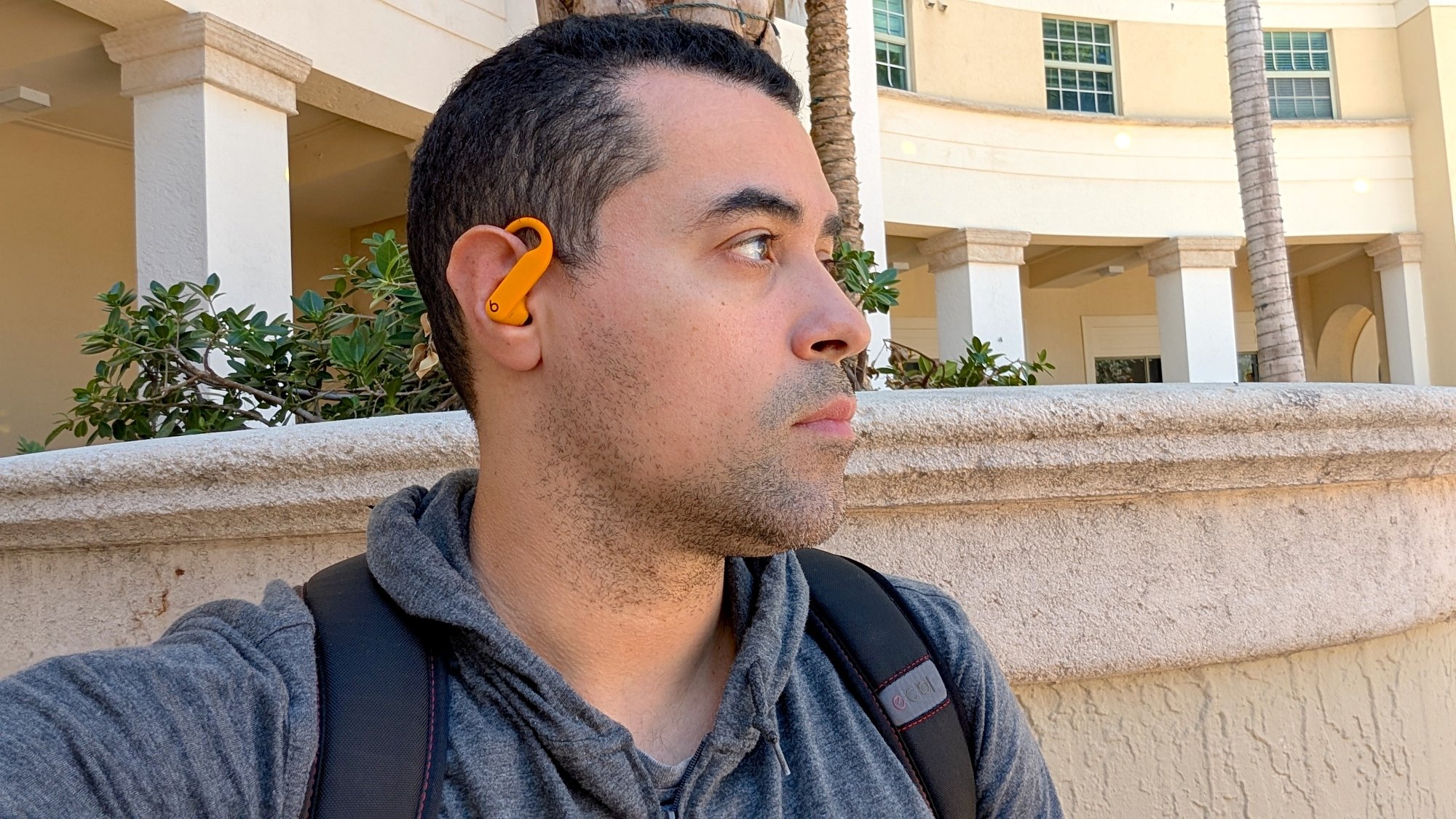 author wearing beats powerbeats pro 2 earbuds