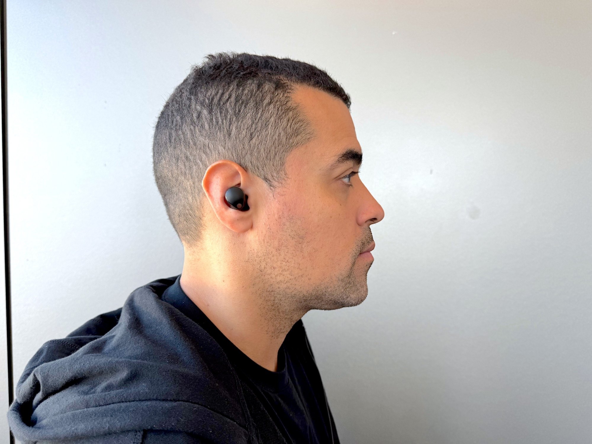 the author wearingsony earbuds