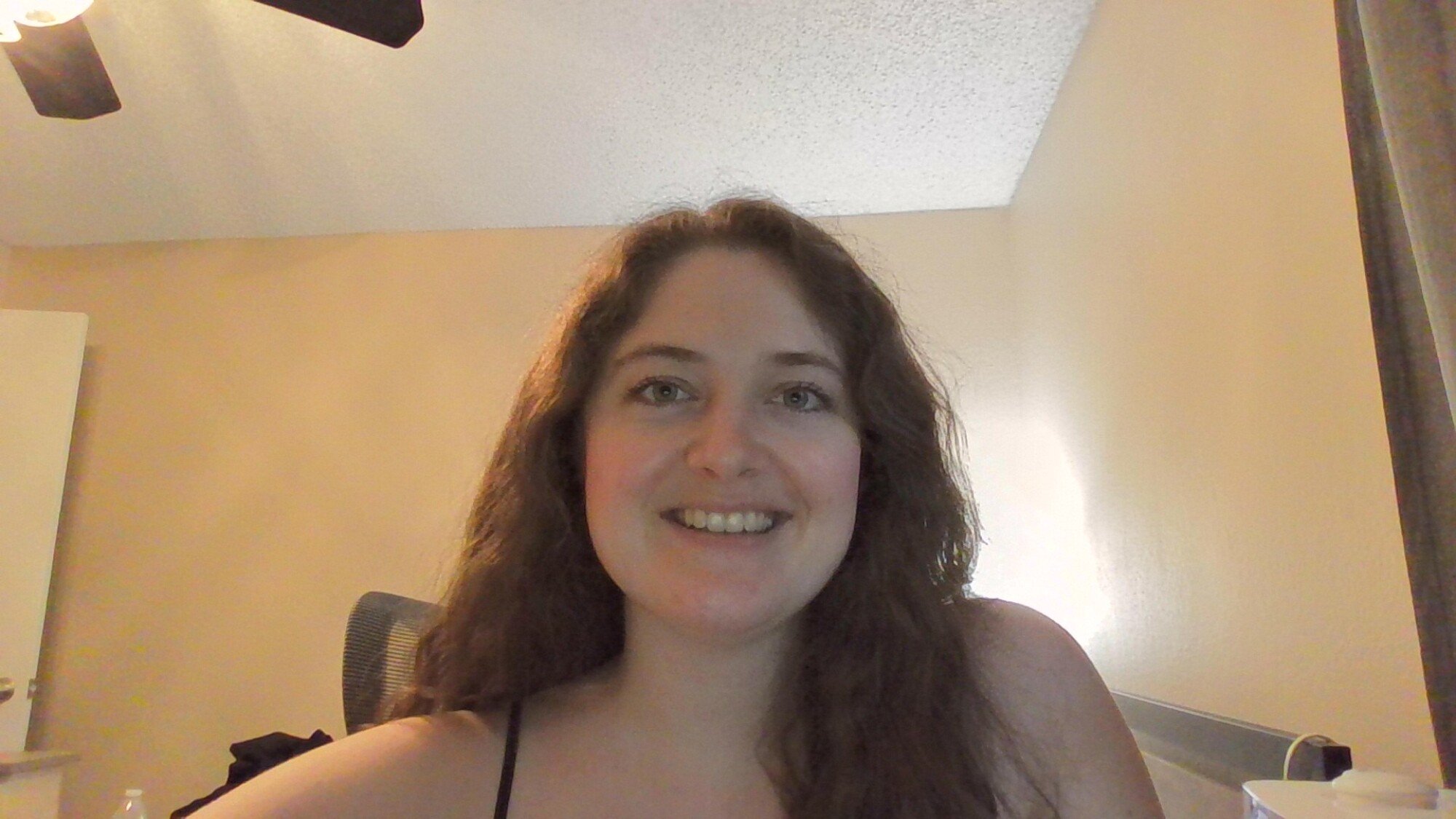 A selfie of reviewer Sarah Chaney taken on the Dell 14 Plus 2-in-1's webcam