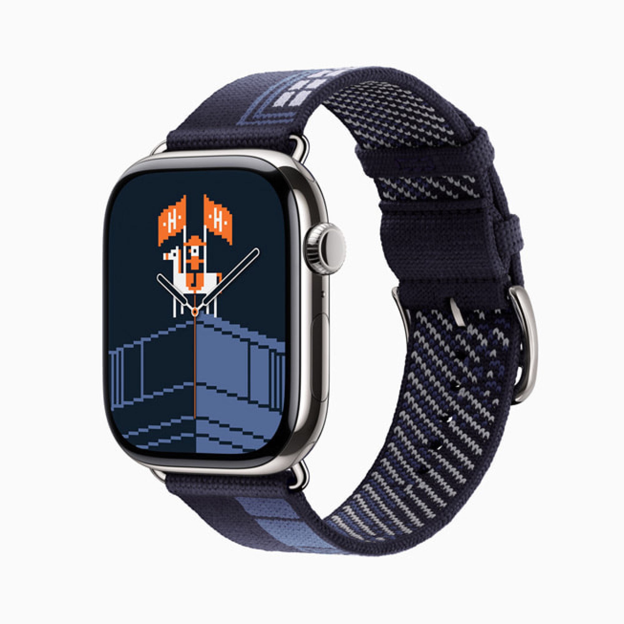 An Apple watch displays an animated face featuring a horse and an orange flag displaying an"H" for Hermès