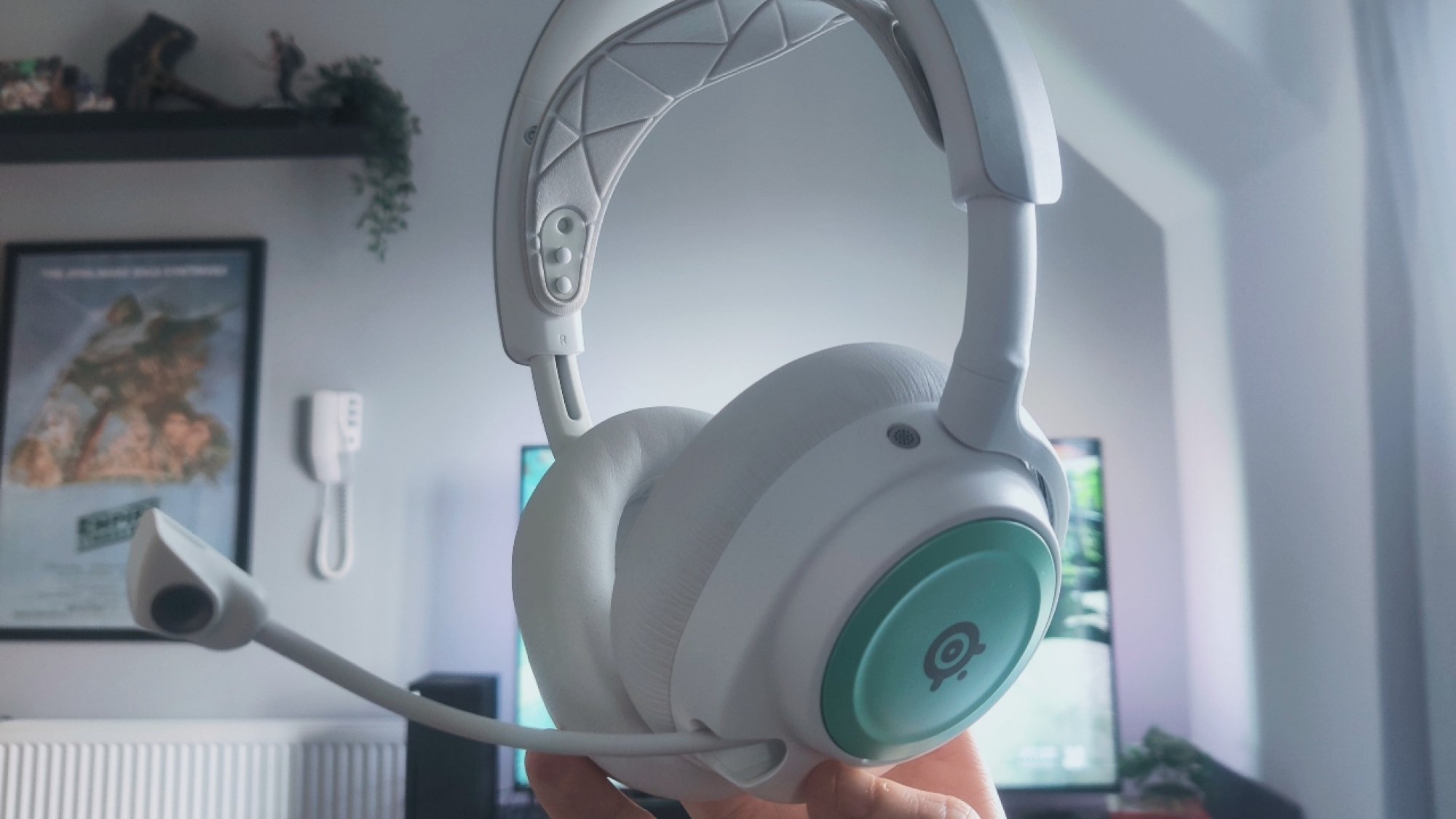 The SteelSeries Arctis Nova Pro Wireless gaming headset with the microphone extended out