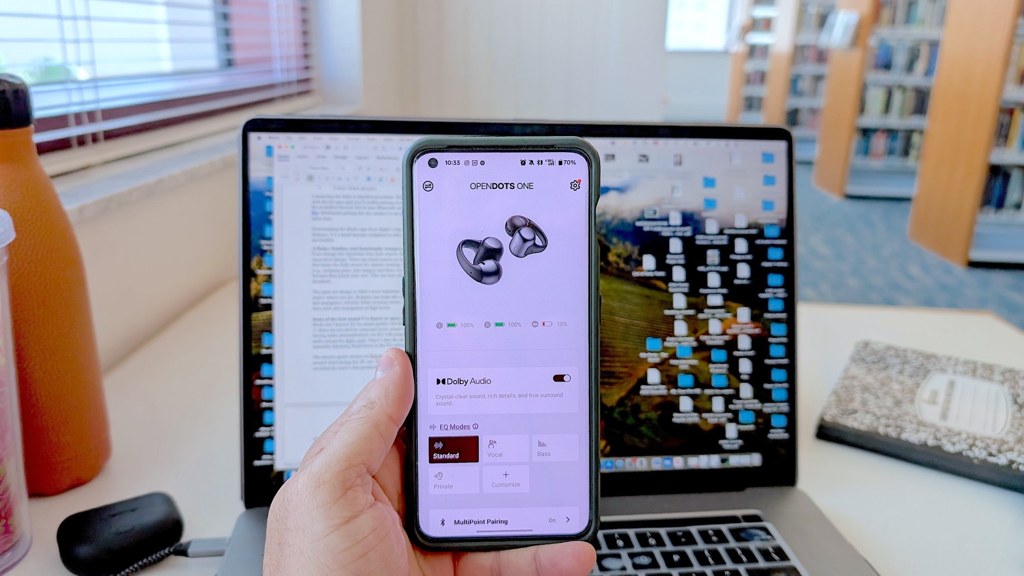 phone showing multipoint pairing feature on earbuds