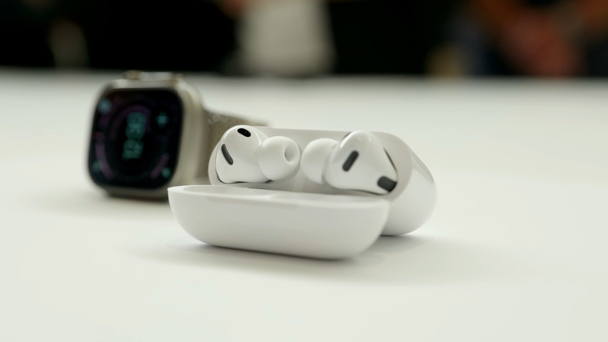 apple airpods pro 3 next to apple watch