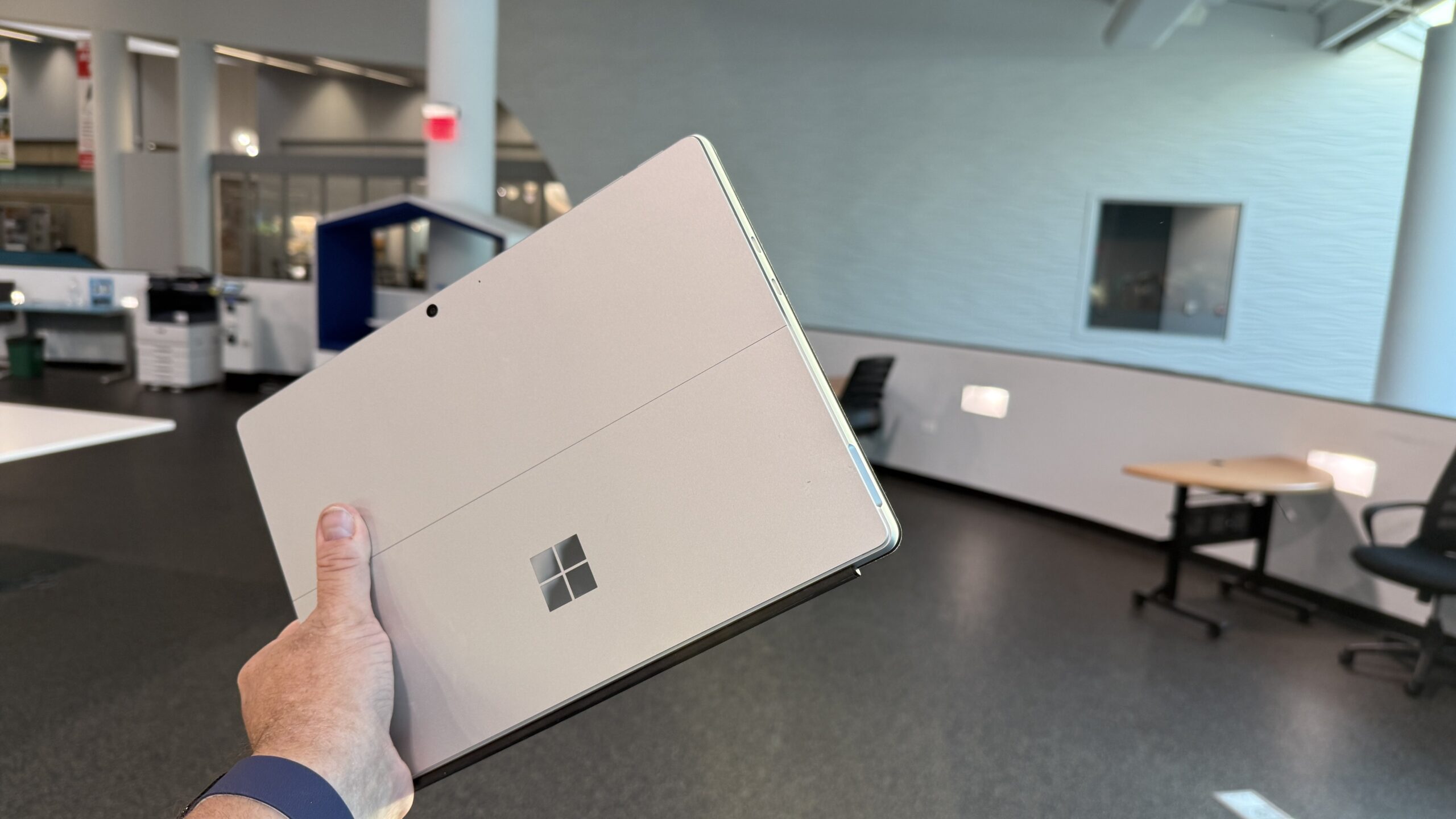microsoft surface pro 13 laptop in hand
