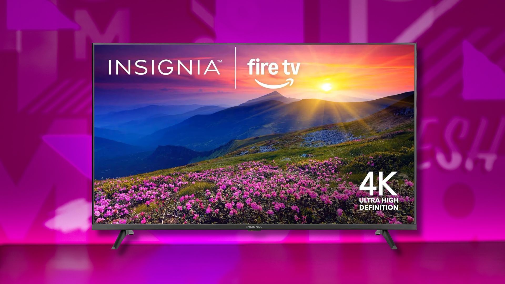insignia 50-inch f50 series led 4k tv against a pink patterned background