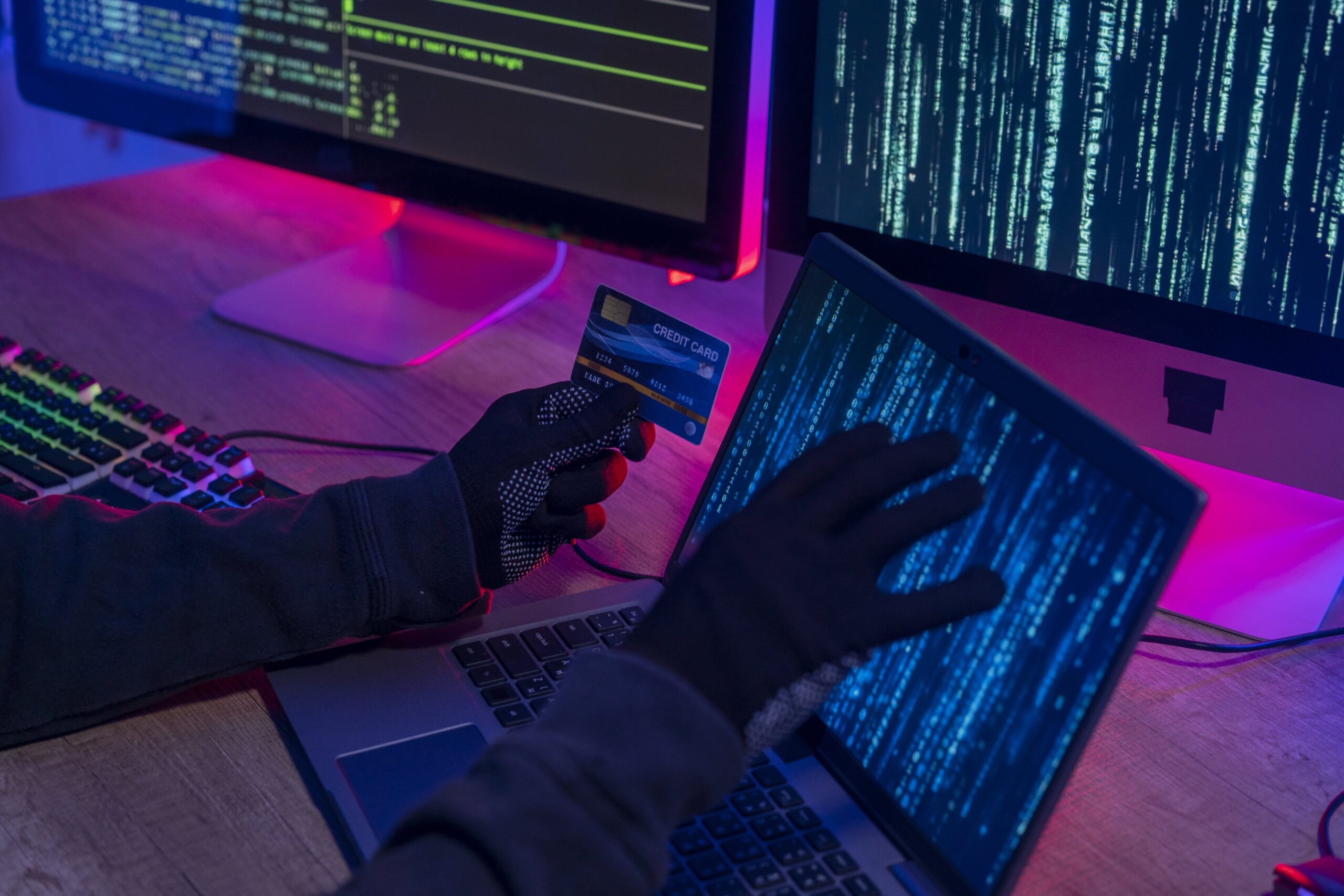 Cropped hands image in criminal anonymous male approaching credit card. Surmise