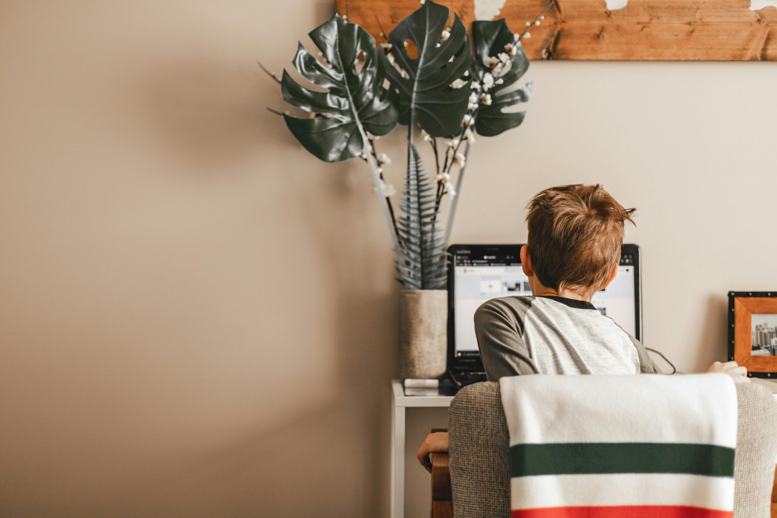 Boy sat at desk