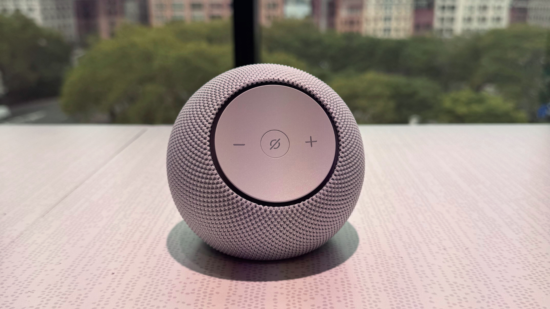 An Amazon Echo Dot Max speaker on a table