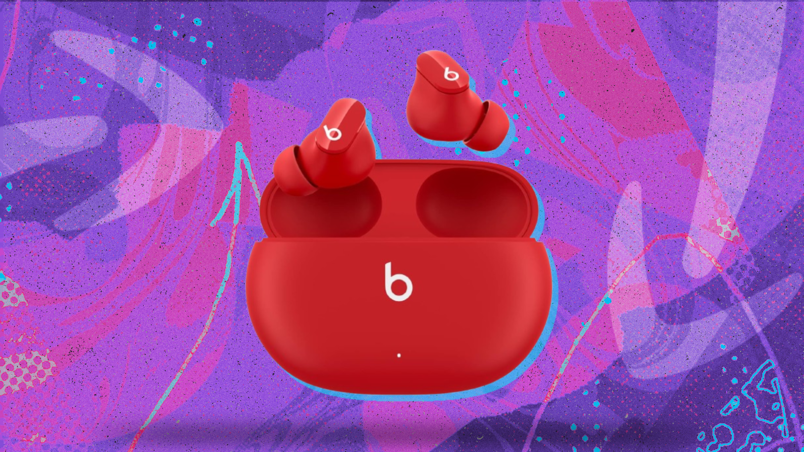 red Beats Studio Buds with purple and pink background