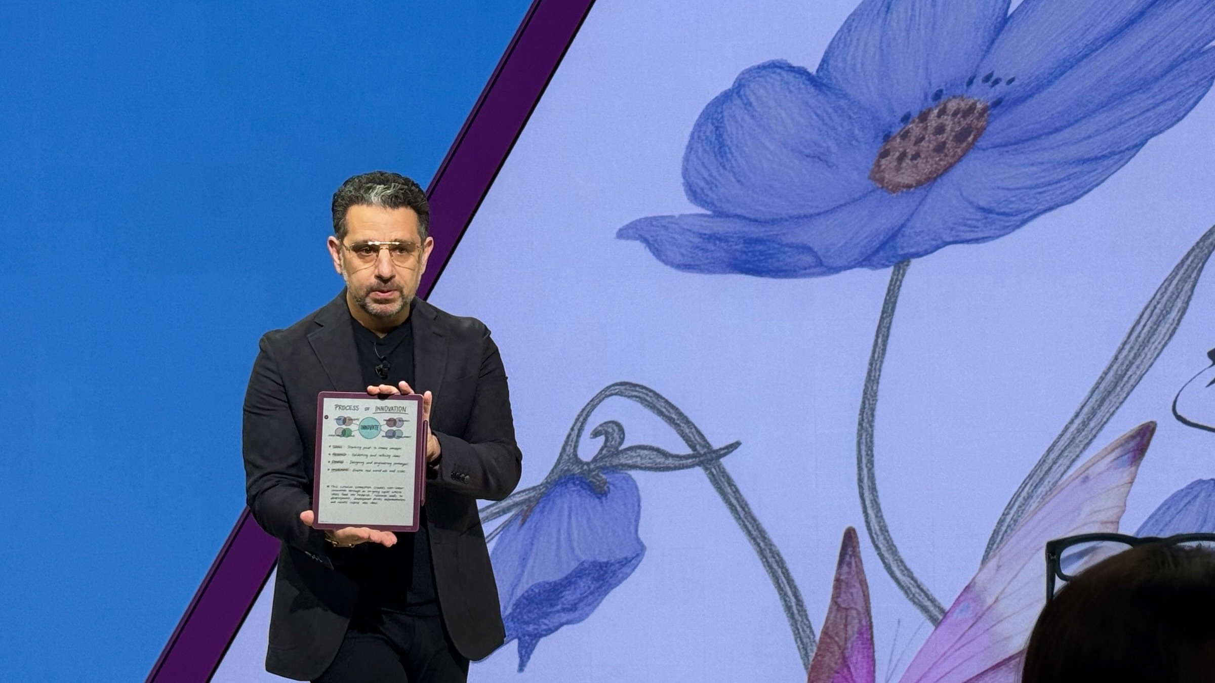 Amazon senior vice president Panos Panay holds new kindle scribe colorsoft