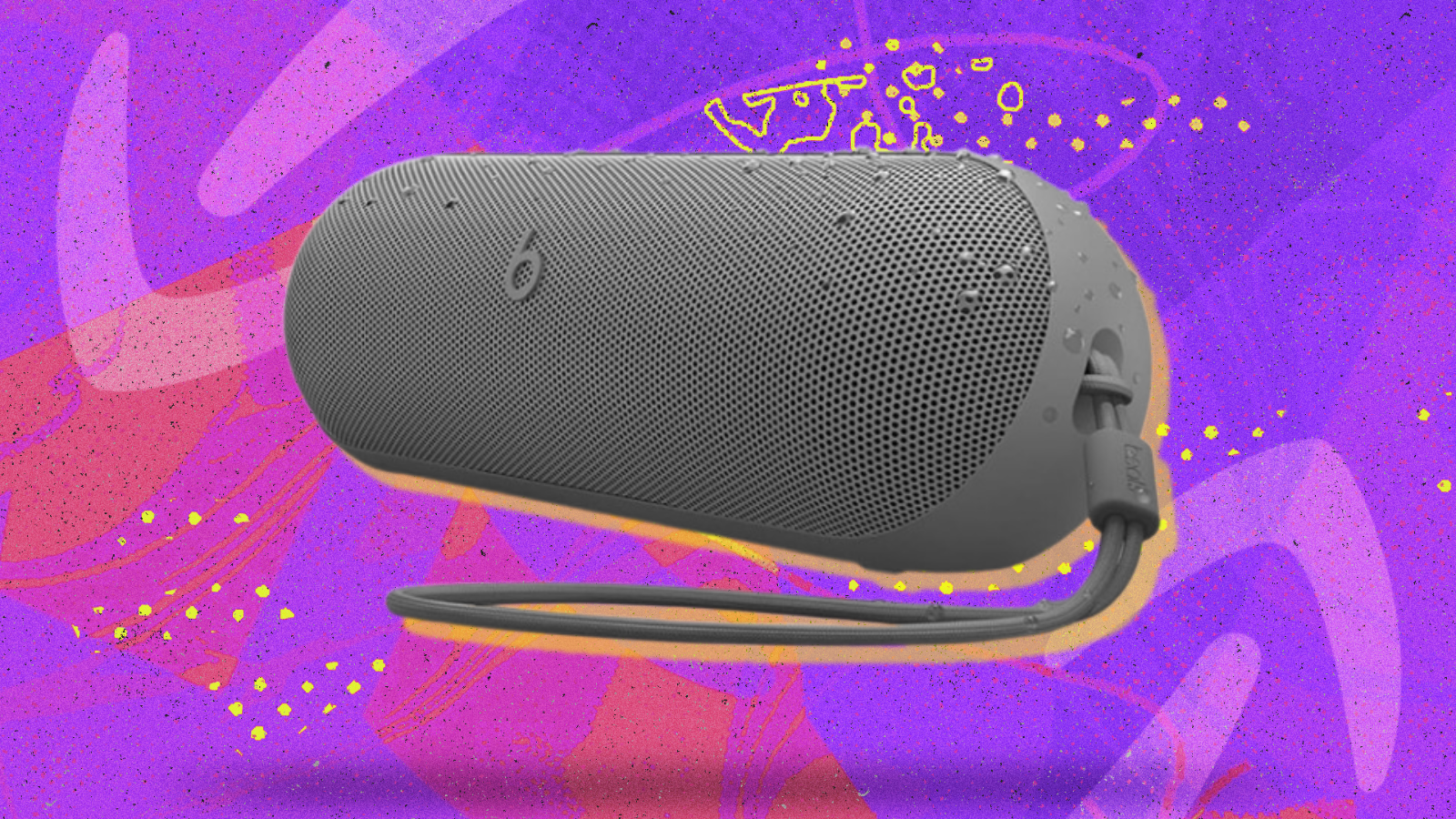 Beats Pill speaker in gray with pink and purple background
