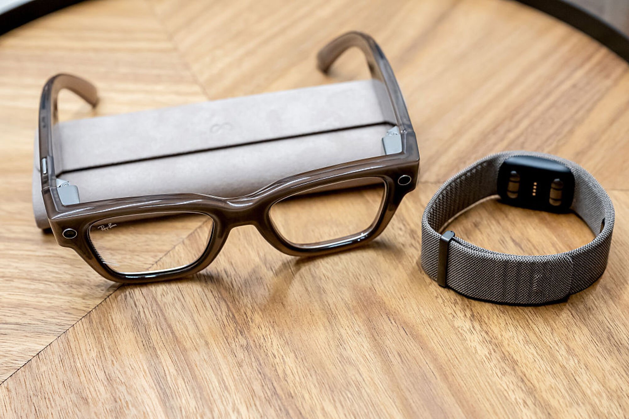 Meta Ray-Ban Display with neural band on wooden table