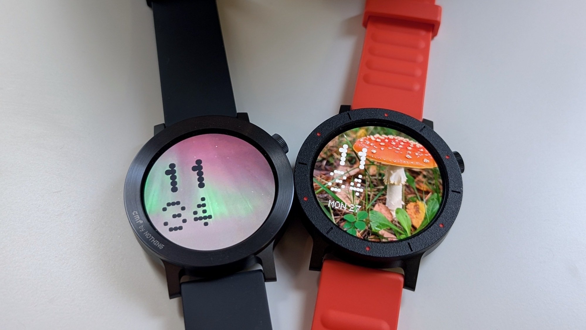 two CMF by nothing watch 3 pros on a white table