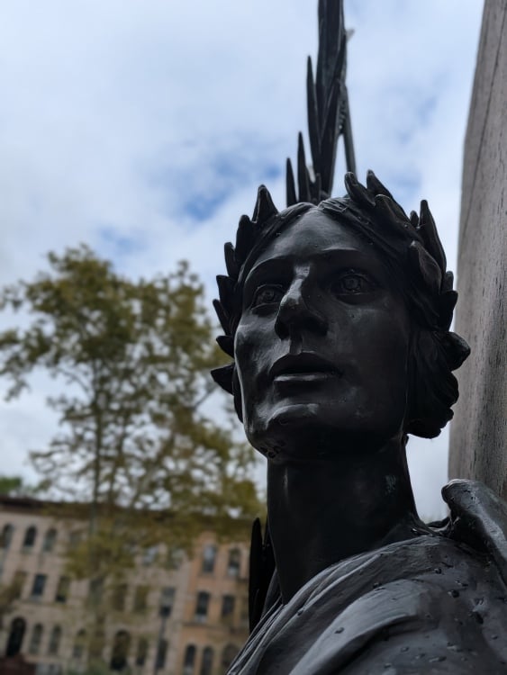 A statue in Brooklyn shot using portrait mode