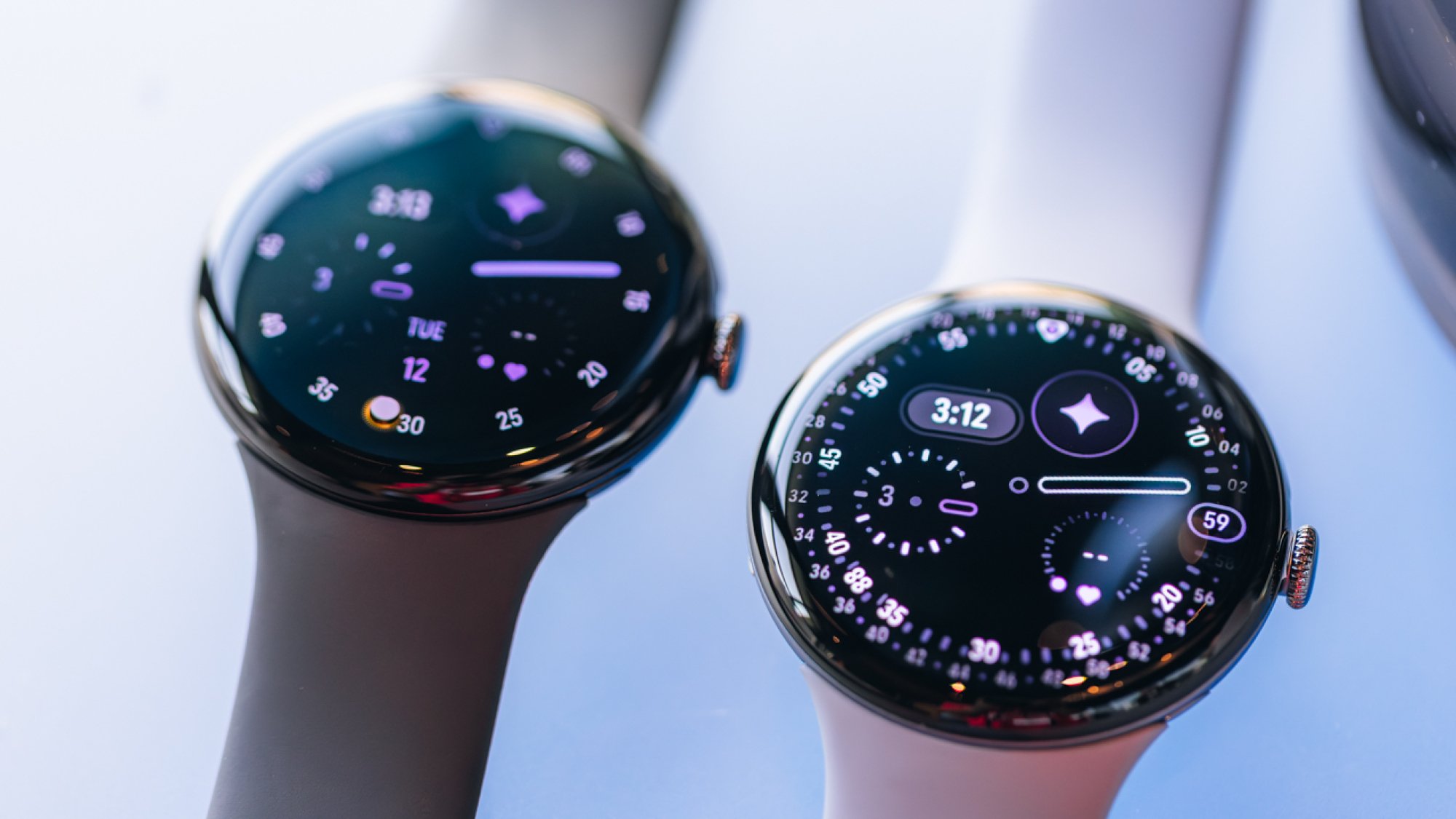 close-up portrait of two google pixel 4 smartwatches on display
