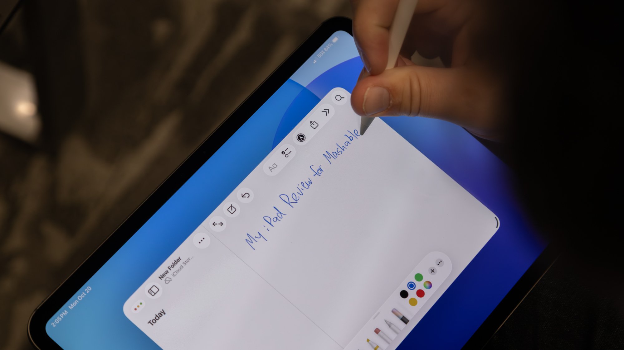 person using apple pencil on ipad pro