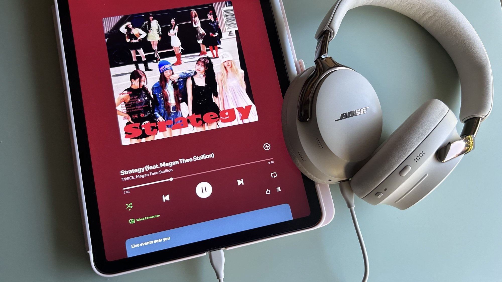 bose headphones plugged into ipad with usb-c cable